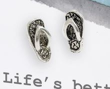 Campevan with silver flip flip earrings